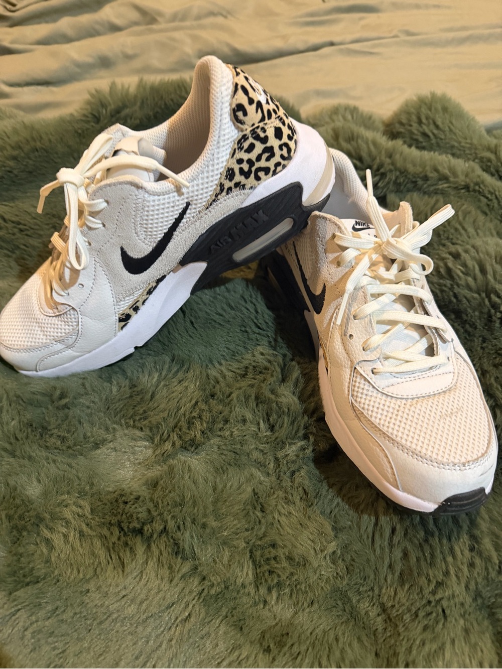Nike Women’s White Sneakers with Leopard Accent and Black Swoosh